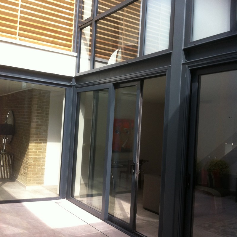Anthracite aluminium sliding patio doors fitted in Forest Gate
