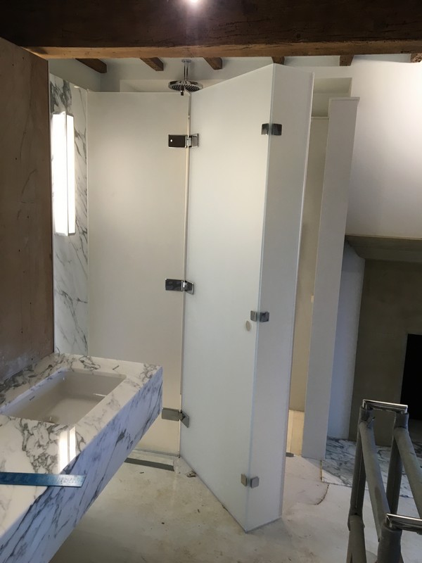 Bespoke frosted glass shower enclosure in Forest Gate luxury bathroom